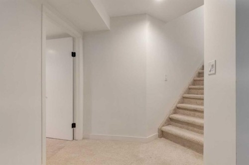 113 Straddock Terrace Sw, Calgary, AB - Indoor Photo Showing Other Room