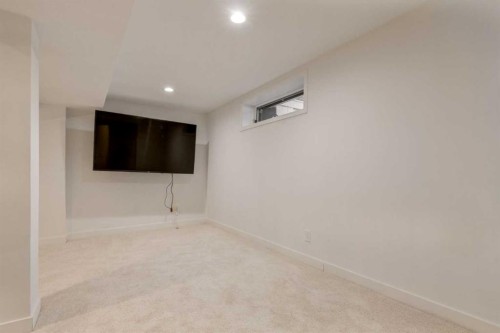 113 Straddock Terrace Sw, Calgary, AB - Indoor Photo Showing Other Room