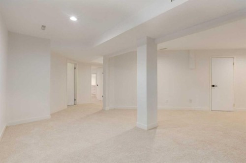 113 Straddock Terrace Sw, Calgary, AB - Indoor Photo Showing Other Room