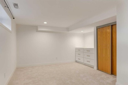 113 Straddock Terrace Sw, Calgary, AB - Indoor Photo Showing Other Room