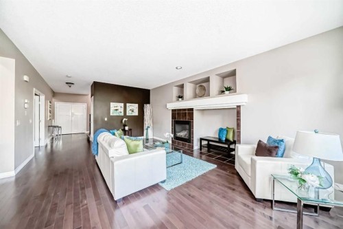 77 Chaparral Valley Grove Se, Calgary, AB - Indoor Photo Showing Living Room With Fireplace