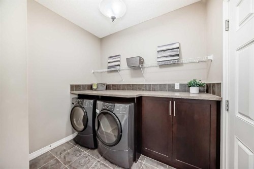 77 Chaparral Valley Grove Se, Calgary, AB - Indoor Photo Showing Laundry Room