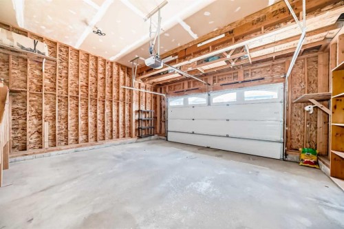 77 Chaparral Valley Grove Se, Calgary, AB - Indoor Photo Showing Garage