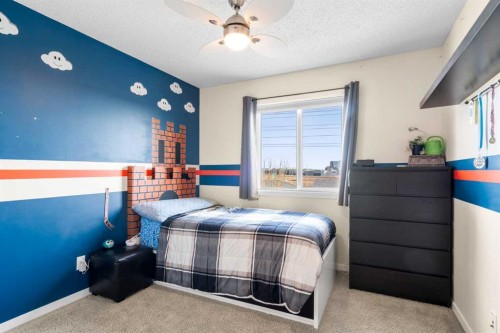 17 Cranford Place Se, Calgary, AB - Indoor Photo Showing Bedroom