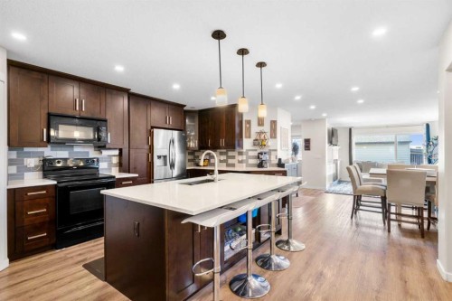 17 Cranford Place Se, Calgary, AB - Indoor Photo Showing Kitchen With Upgraded Kitchen