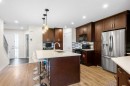 17 Cranford Place Se, Calgary, AB  - Indoor Photo Showing Kitchen With Upgraded Kitchen 