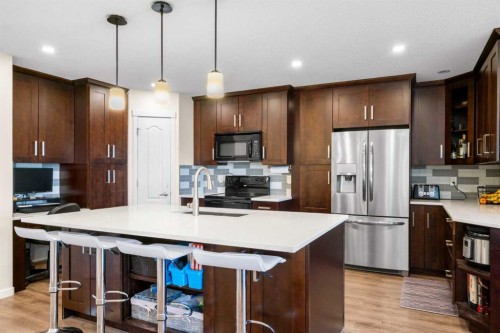 17 Cranford Place Se, Calgary, AB - Indoor Photo Showing Kitchen