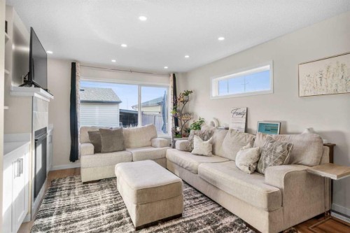 17 Cranford Place Se, Calgary, AB - Indoor Photo Showing Living Room