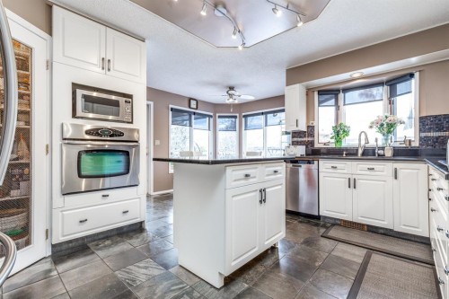 63 Edgeridge Court Nw, Calgary, AB - Indoor Photo Showing Kitchen With Stainless Steel Kitchen With Upgraded Kitchen