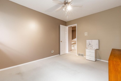 63 Edgeridge Court Nw, Calgary, AB - Indoor Photo Showing Other Room