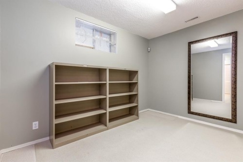 63 Edgeridge Court Nw, Calgary, AB - Indoor Photo Showing Other Room