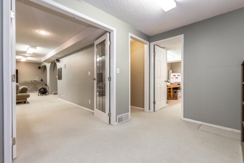 63 Edgeridge Court Nw, Calgary, AB - Indoor Photo Showing Other Room