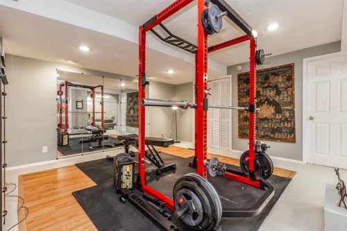 63 Edgeridge Court Nw, Calgary, AB - Indoor Photo Showing Gym Room