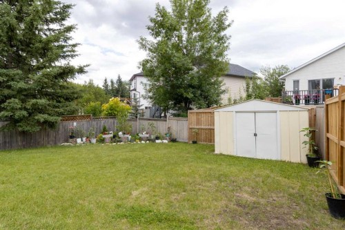 31 Bridlewood Road Sw, Calgary, AB - Outdoor With Backyard