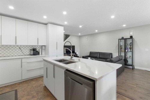 31 Bridlewood Road Sw, Calgary, AB - Indoor Photo Showing Kitchen With Double Sink With Upgraded Kitchen