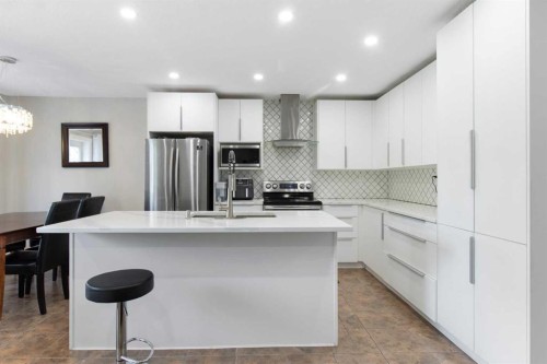 31 Bridlewood Road Sw, Calgary, AB - Indoor Photo Showing Kitchen With Stainless Steel Kitchen With Upgraded Kitchen