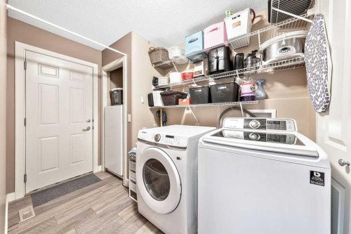 20 Sherwood Rise Nw, Calgary, AB - Indoor Photo Showing Laundry Room