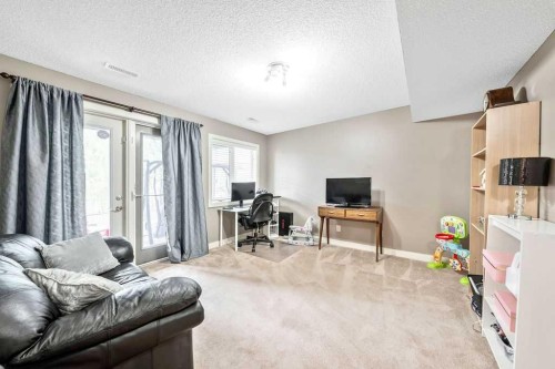 20 Sherwood Rise Nw, Calgary, AB - Indoor Photo Showing Living Room