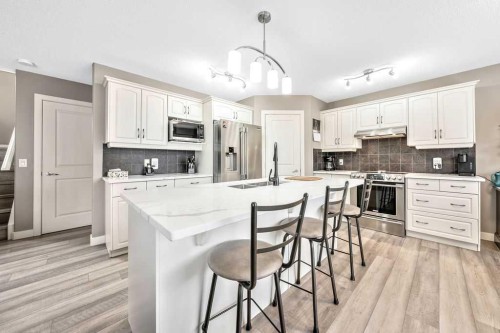 20 Sherwood Rise Nw, Calgary, AB - Indoor Photo Showing Kitchen With Double Sink With Upgraded Kitchen