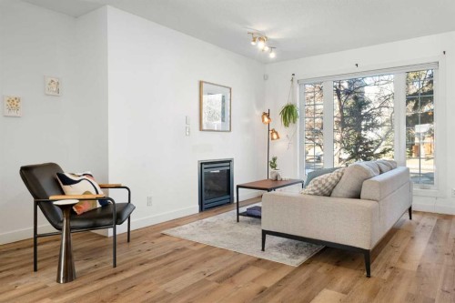 2213 31 Avenue Sw, Calgary, AB - Indoor Photo Showing Living Room With Fireplace