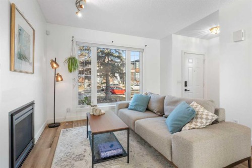 2213 31 Avenue Sw, Calgary, AB - Indoor Photo Showing Living Room With Fireplace