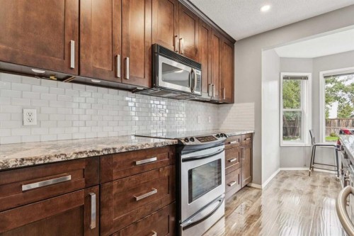 132 Citadel Meadow Bay Nw, Calgary, AB - Indoor Photo Showing Kitchen With Upgraded Kitchen