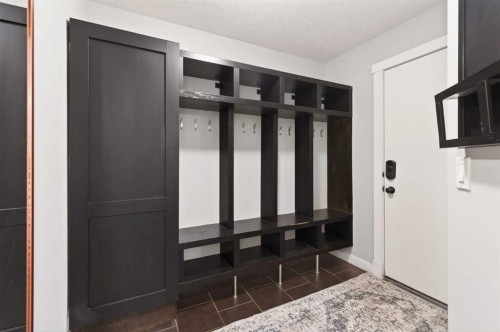 4 Cougarstone Square Sw, Calgary, AB - Indoor Photo Showing Other Room