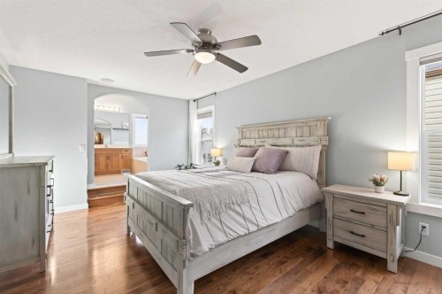 4 Cougarstone Square Sw, Calgary, AB - Indoor Photo Showing Bedroom