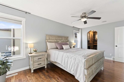 4 Cougarstone Square Sw, Calgary, AB - Indoor Photo Showing Bedroom