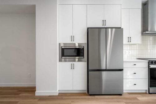 202-550 Seton Circle Se, Calgary, AB - Indoor Photo Showing Kitchen