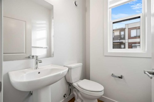 202-550 Seton Circle Se, Calgary, AB - Indoor Photo Showing Bathroom