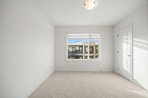 202-550 Seton Circle Se, Calgary, AB - Indoor Photo Showing Other Room