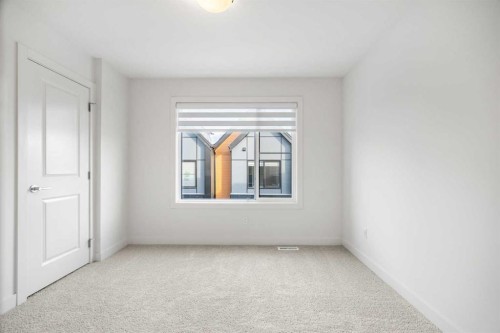 202-550 Seton Circle Se, Calgary, AB - Indoor Photo Showing Other Room