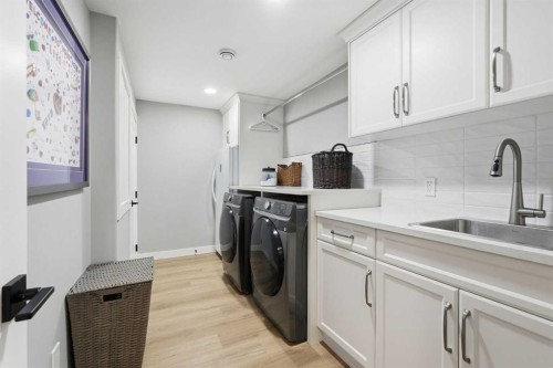 8615 7 Street Sw, Calgary, AB - Indoor Photo Showing Laundry Room