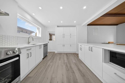 414 12 Avenue Nw, Calgary, AB - Indoor Photo Showing Kitchen With Upgraded Kitchen