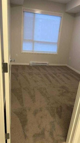 3210-33 Carringham Gate Nw, Calgary, AB - Indoor Photo Showing Other Room
