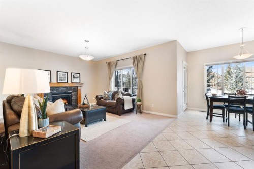 8 Heritage Cove, Heritage Pointe, AB - Indoor Photo Showing Living Room With Fireplace