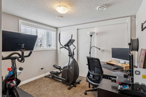 61 Nolancrest Gate Nw, Calgary, AB - Indoor Photo Showing Gym Room
