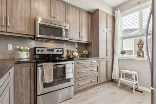 61 Nolancrest Gate Nw, Calgary, AB - Indoor Photo Showing Kitchen With Stainless Steel Kitchen With Upgraded Kitchen