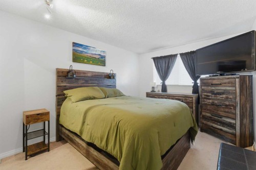 96 Abberfield Crescent Ne, Calgary, AB - Indoor Photo Showing Bedroom