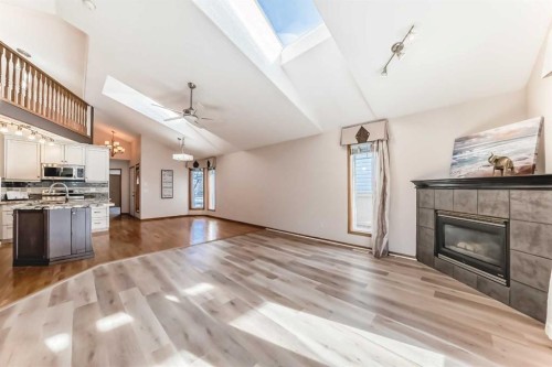 110 Somerglen Road Sw, Calgary, AB - Indoor With Fireplace