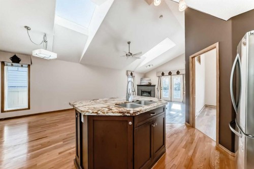 110 Somerglen Road Sw, Calgary, AB - Indoor Photo Showing Kitchen With Double Sink
