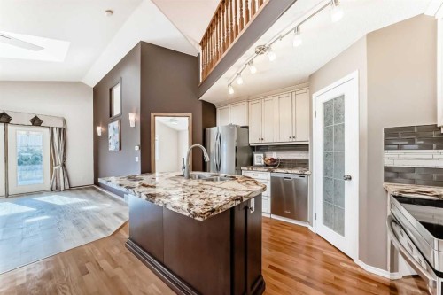 110 Somerglen Road Sw, Calgary, AB - Indoor Photo Showing Kitchen With Stainless Steel Kitchen With Double Sink With Upgraded Kitchen