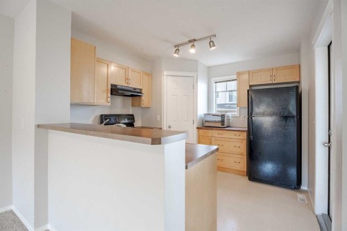 122 Panamount Drive Nw, Calgary, AB - Indoor Photo Showing Kitchen