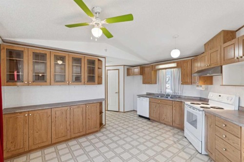 1909 29 Avenue, Nanton, AB - Indoor Photo Showing Kitchen With Double Sink