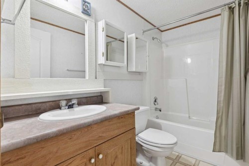 1909 29 Avenue, Nanton, AB - Indoor Photo Showing Bathroom