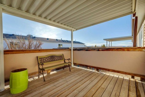 1909 29 Avenue, Nanton, AB - Outdoor With Deck Patio Veranda With View With Exterior