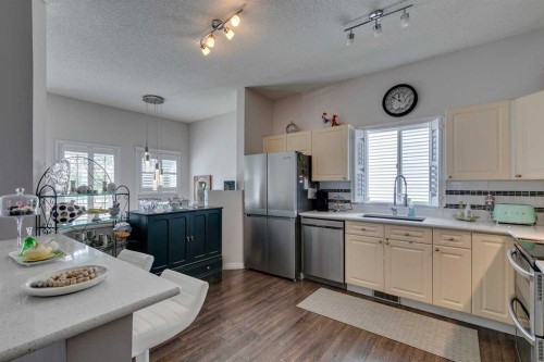 271 Tuscany Valley Drive Nw, Calgary, AB - Indoor Photo Showing Kitchen With Stainless Steel Kitchen