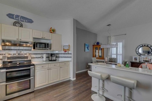 271 Tuscany Valley Drive Nw, Calgary, AB - Indoor Photo Showing Kitchen