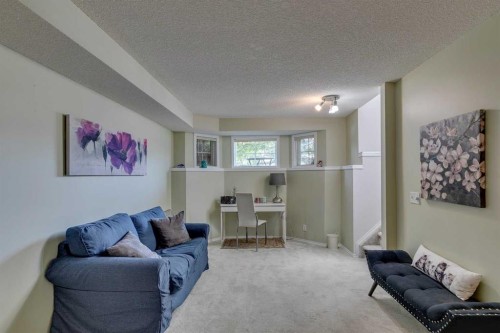 271 Tuscany Valley Drive Nw, Calgary, AB - Indoor Photo Showing Living Room